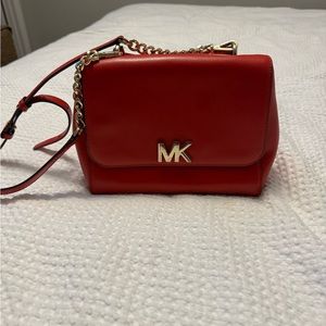 Medium cross body Michael Kors bag red